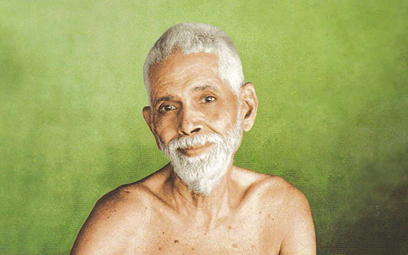 Compassionate Ramana Maharshi infront of green wall
