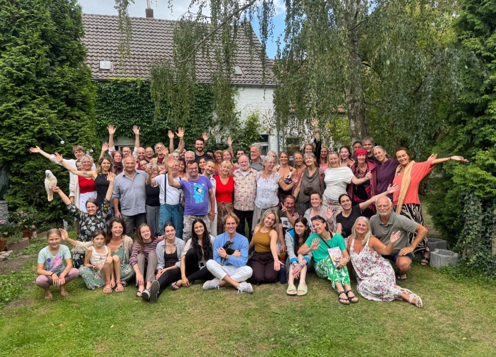 John David with the community in the garden